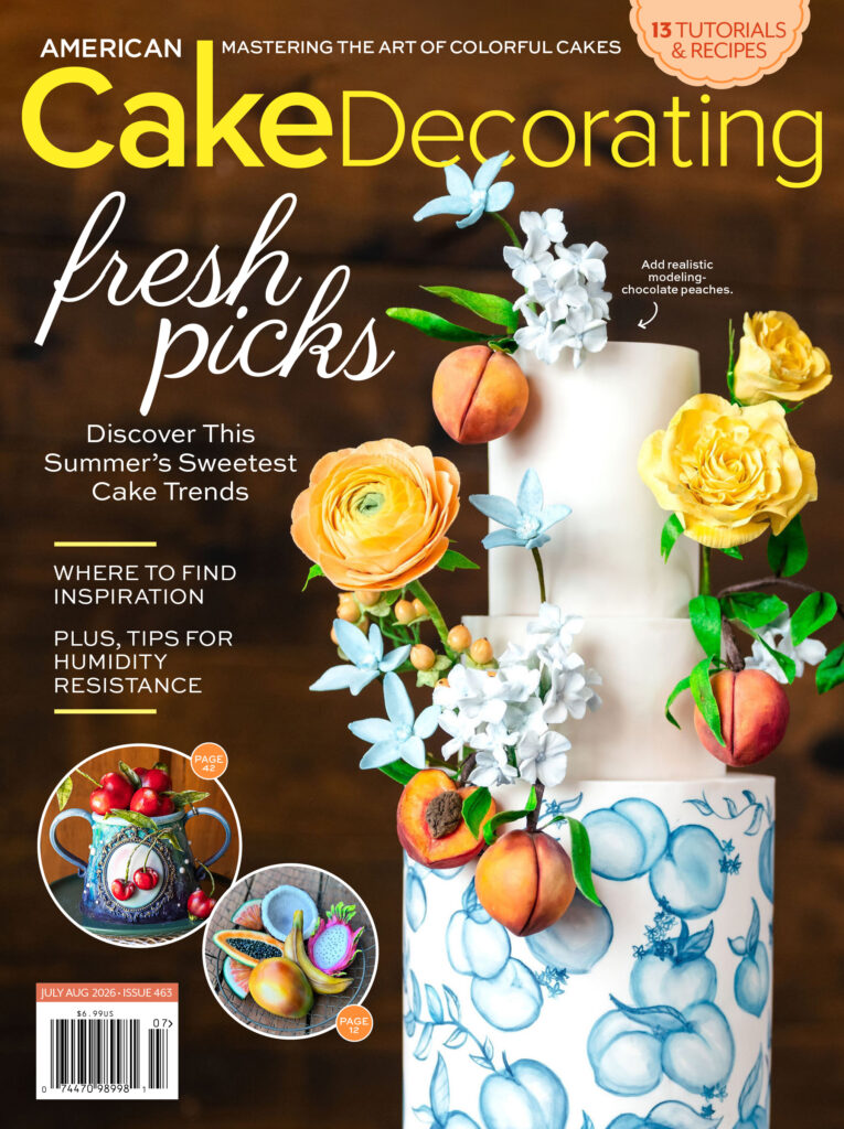 American Cake Decorating July/August 2026 magazine cover featuring a peach-inspired tiered cake decorated with sugar flowers, modeling chocolate peaches, and summer cake decorating trends.