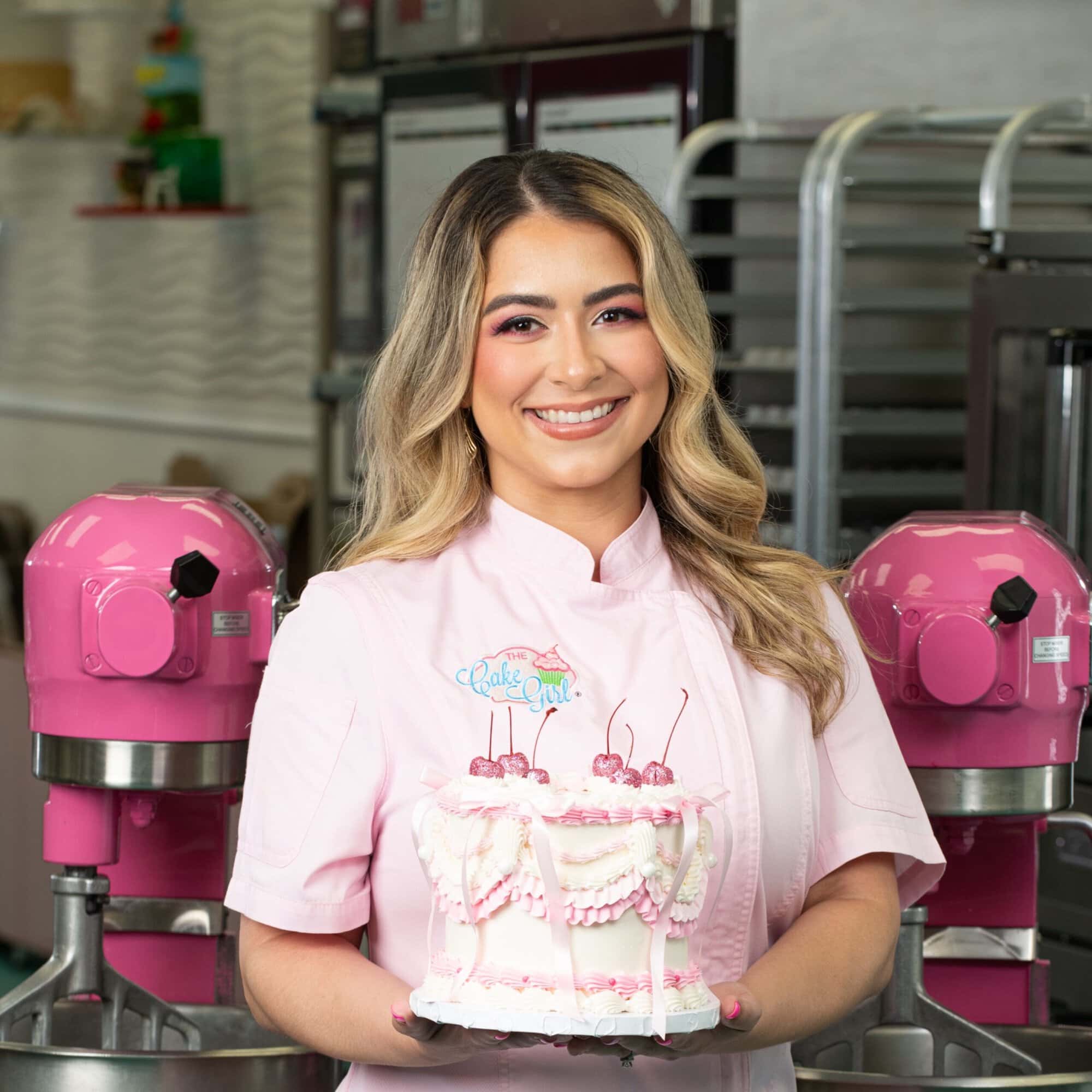 Kristina Lavallee Headshot Kitchen with Cake Kristina Lavallee, Founder and CEO of The Cake Girl and Crave'n Cups